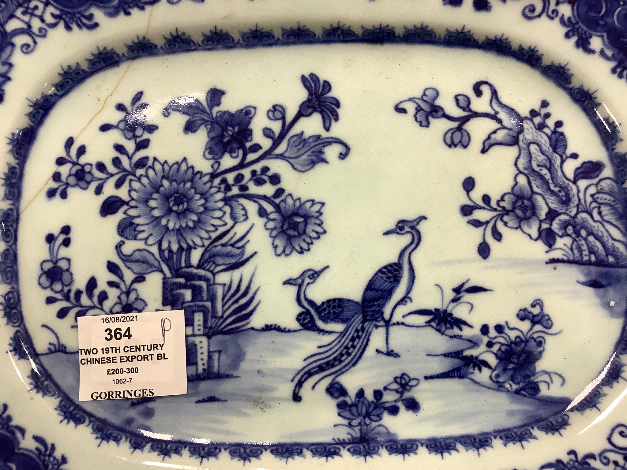 Two 18th century Chinese export blue and white meat dishes, largest 43cm